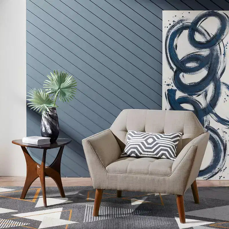 Poltrona singola in velluto trapuntato blu, con struttura in legno
